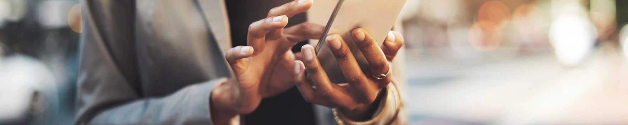 person using smartphone - Flooring Source in the Auburn, MA area