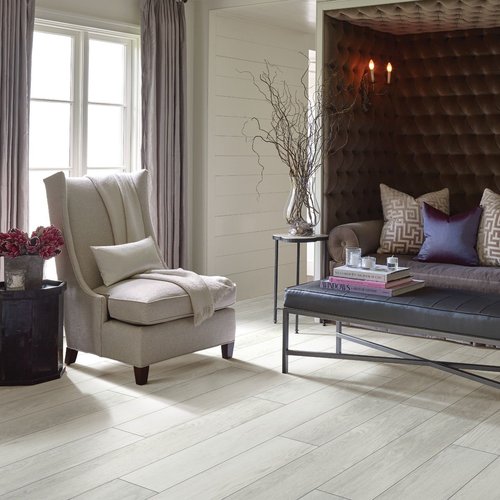 Elegant living room with wood-look luxury vinyl flooring from Flooring Source in the Auburn, MA area