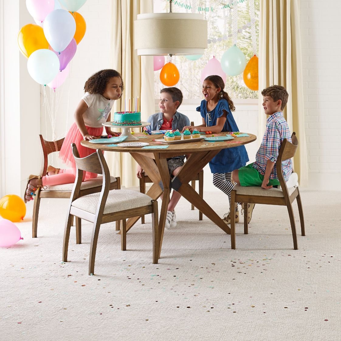 Kids party in room with beige carpet from Flooring Source in the Auburn, MA area