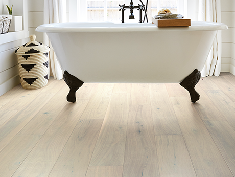Bathroom with wood-look luxury vinyl flooring from Flooring Source in the Auburn, MA area